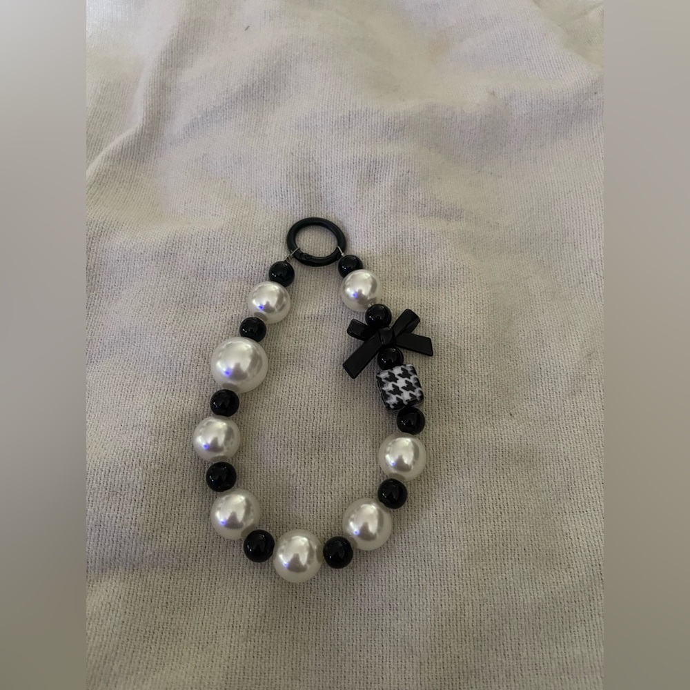 Elegant Black and White Beaded Phone Wristlet
